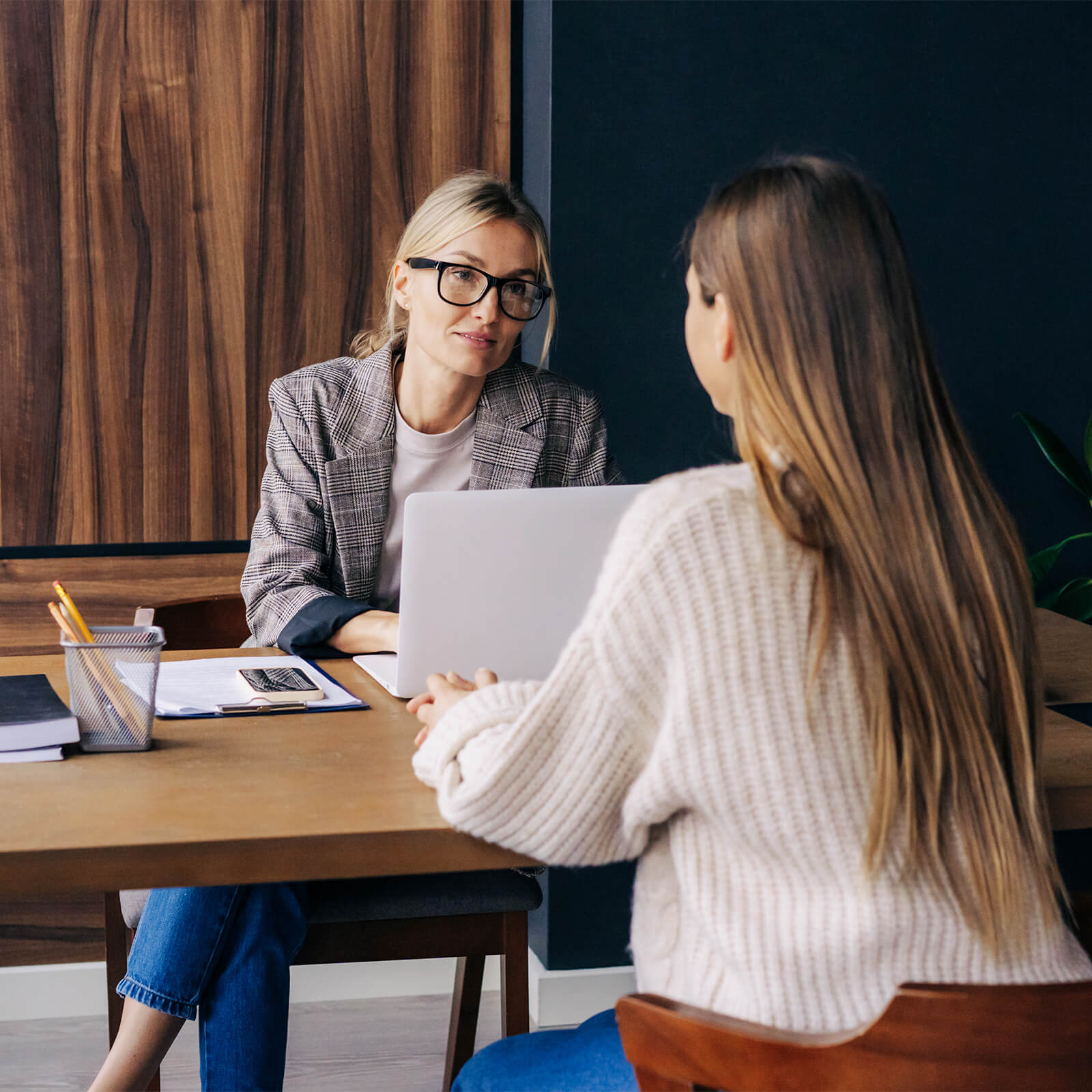 Resolve Divorce Adelaide family lawyer meeting with a client to discuss property settlement and financial agreements.