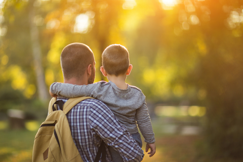 father and son in park